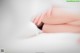 A close up of a woman's legs on a bed.